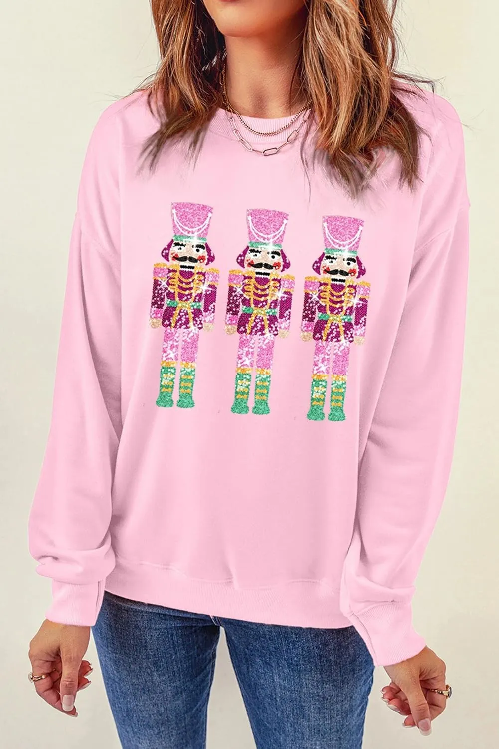 KMBANGI Women Christmas Nutcracker Sweatshirt Holiday Funny Graphic Pullover Top Oversized Crewneck Long Sleeve Shirts